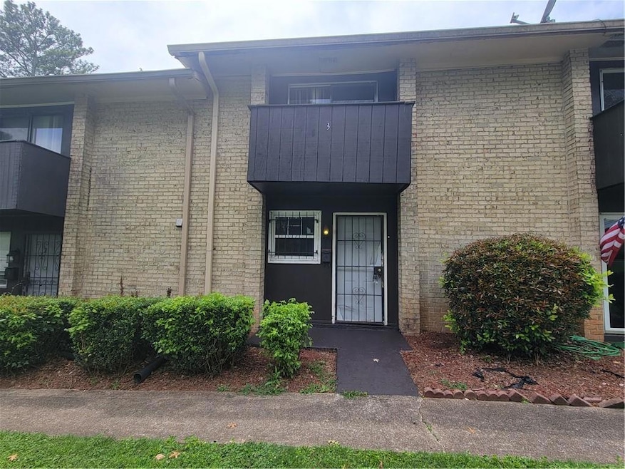 Property entrance with brick siding