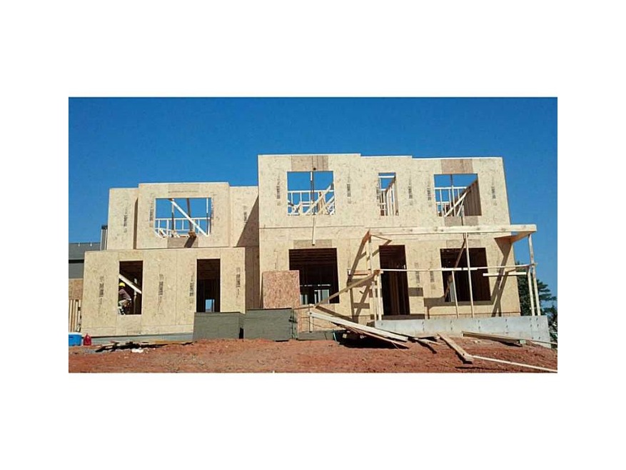 Exterior Front. Glenstone plan with charming brick