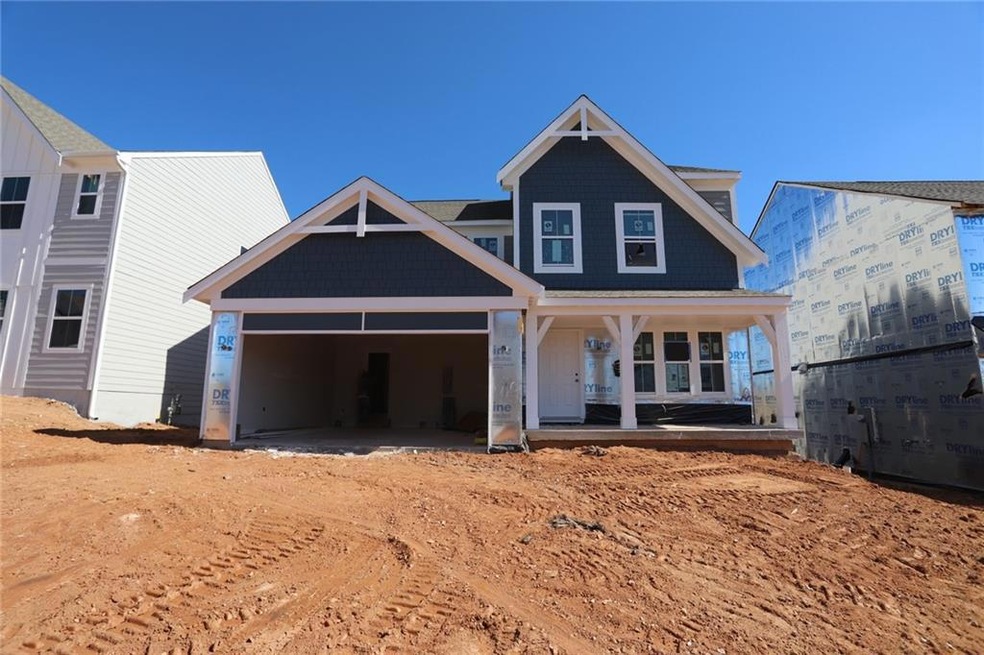 View of front facade featuring covered porch and a
