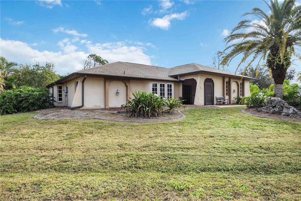 1002 Fleetwood Dr NW, Port Charlotte, FL 33948 - photo 1