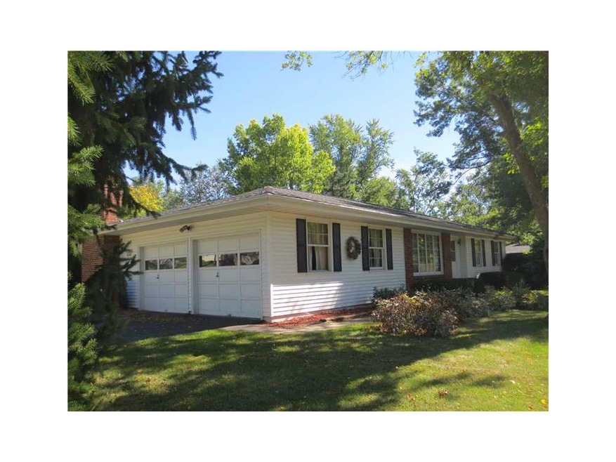 Front Exterior. Double attached garage and plenty 