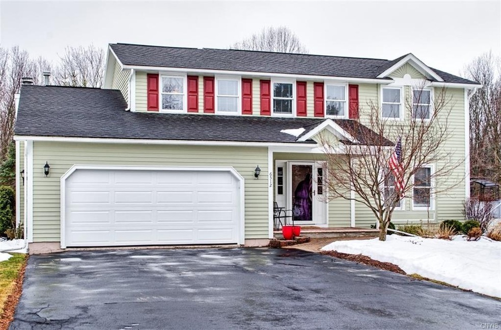 Freshly painted exterior with pavered walkway and 