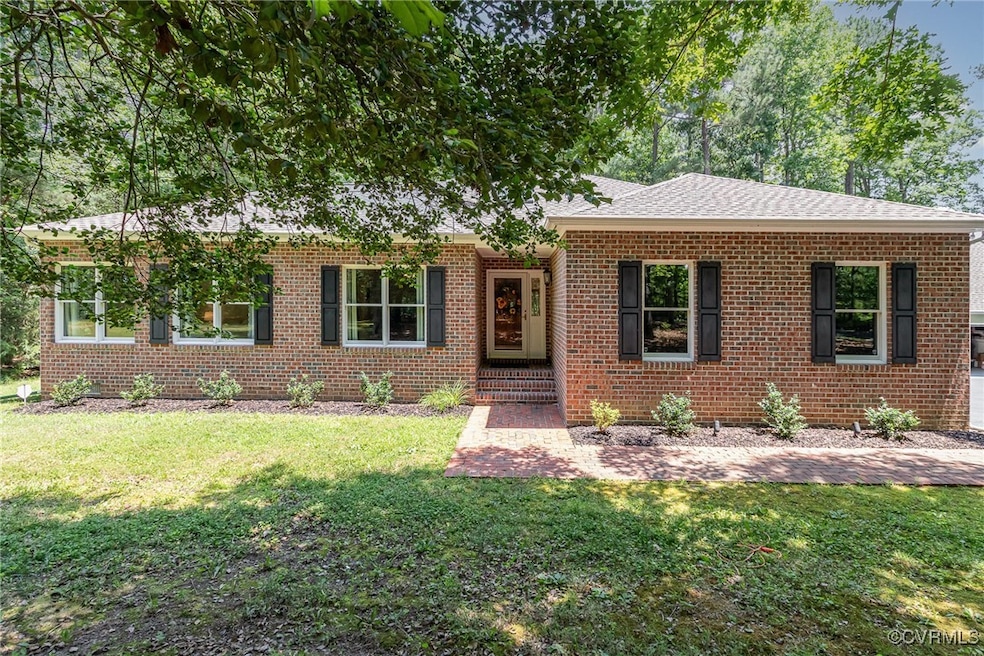 Elegant one level home with brick front and brick