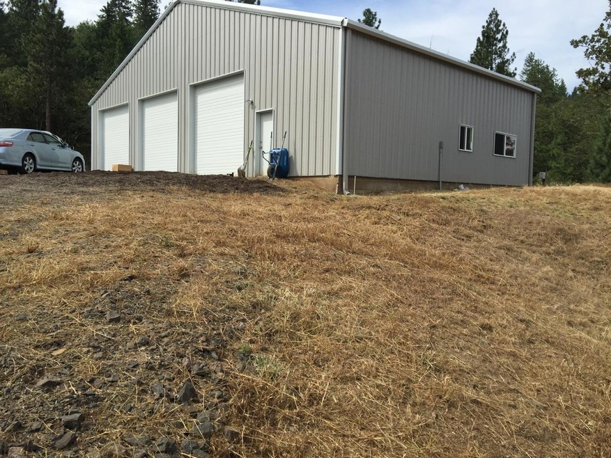 mowed lawn by warehouse pic 7-8-15 good