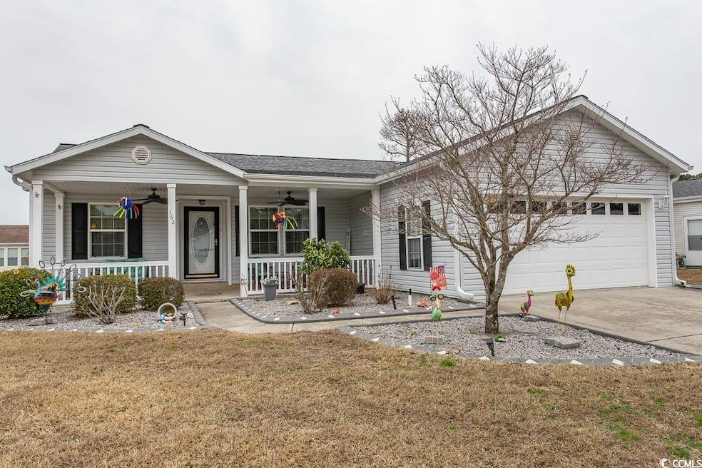 Ranch-style house featuring covered porch, a front