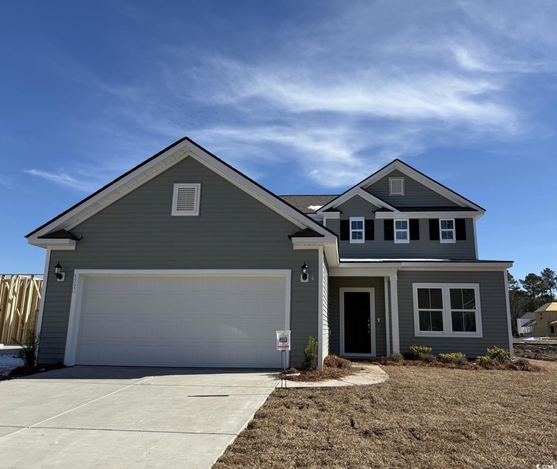 View of front of home with a garage