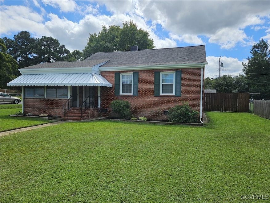 View of front of house with a front lawn