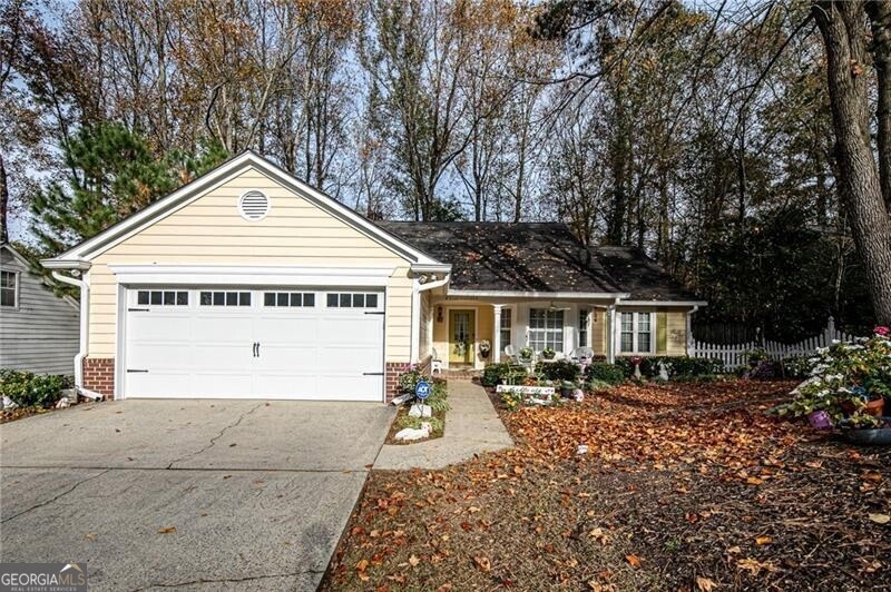 Ranch-style home with a garage
