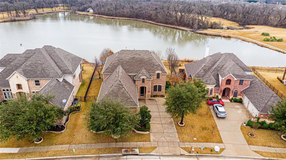 Beautiful 2-story home with an awesome view of the golf course and pond.   Neighborhood goose affectionately named Mama Goose by the sellers, comes up to socialize with the neighbors often  Imagine relaxing on your back porch and enjoying this specta