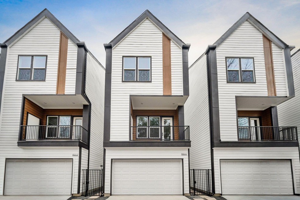Modern multi-story single family with clean white