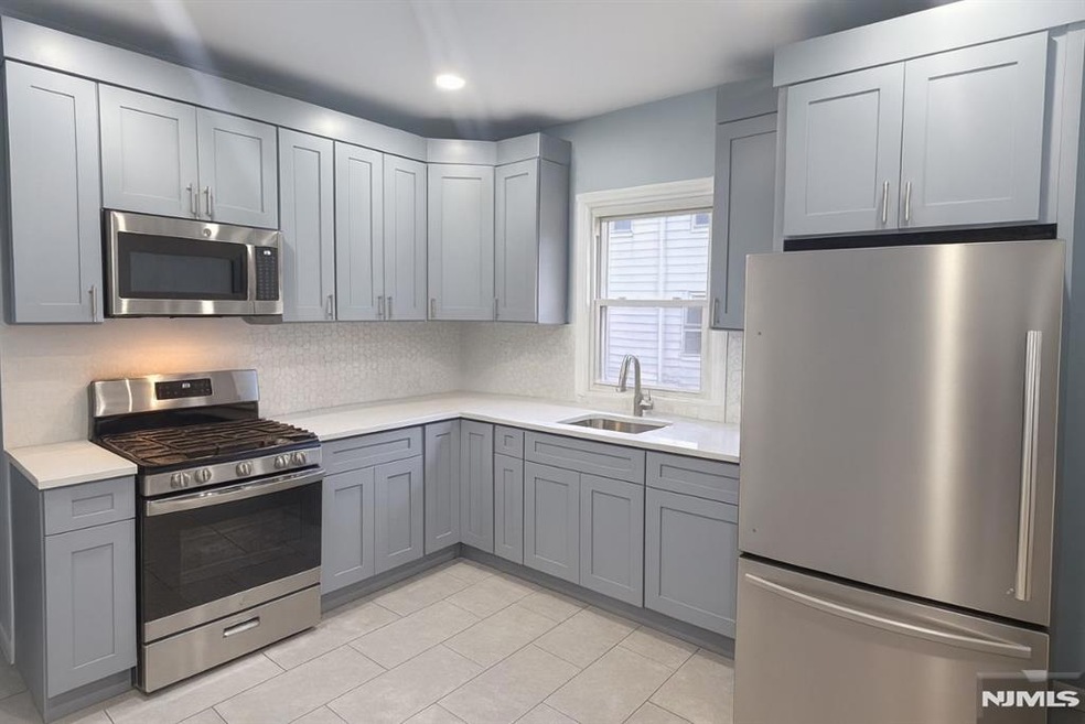 100 Rosa Parks Blvd unit 1, Paterson, NJ 07501 - photo 1