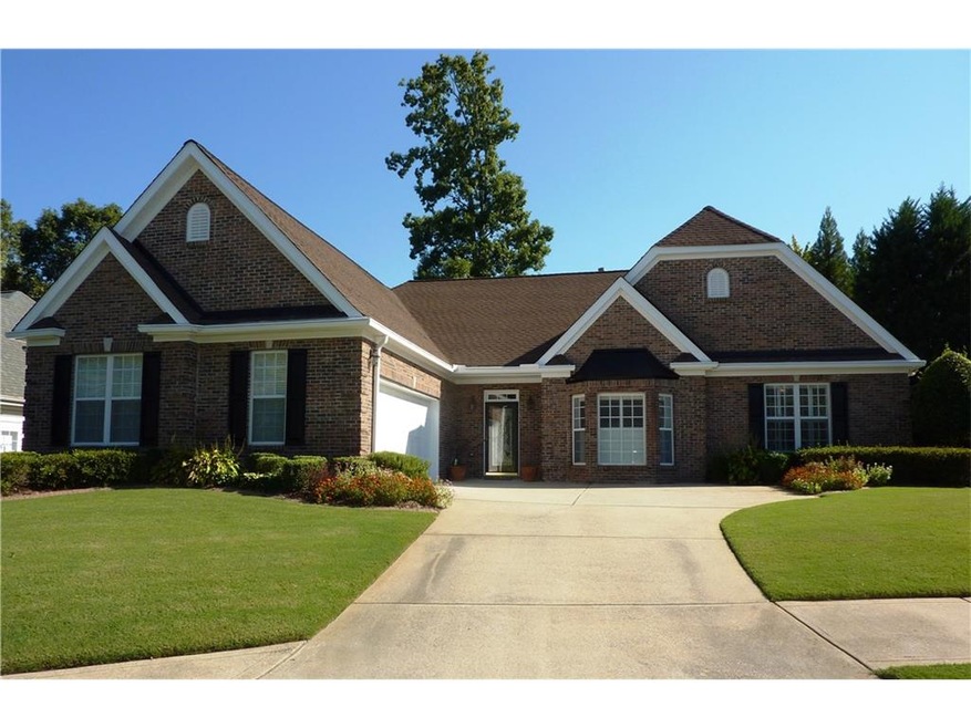 Beautiful 3 Sided Brick home Professionally Landsc