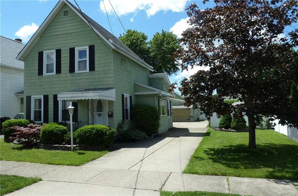 Great lot and home in the City of Tonawanda. With newer cement driveway.  Large retractable awning on side of home.