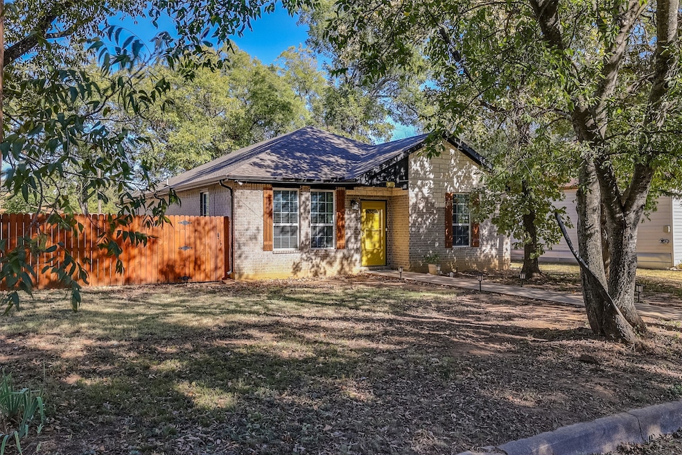View of front of house featuring brick siding