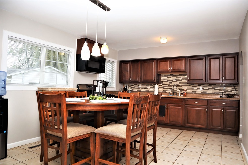 921 Berkley St, Carpentersville, IL 60110 - photo 1