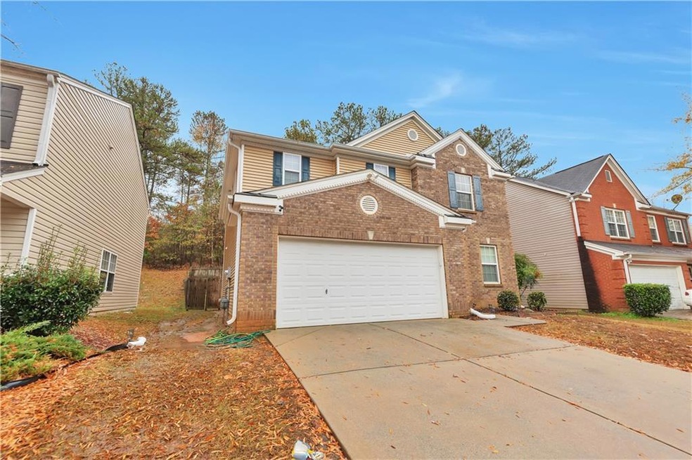 Front of property featuring a garage