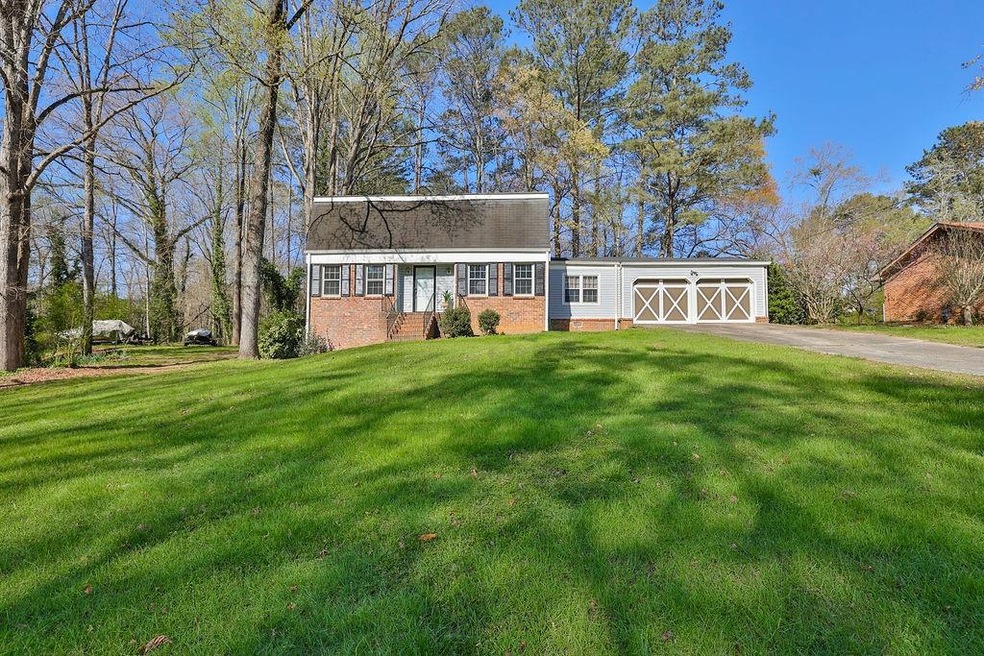 Welcome home! Brick home with attached 2-car garag