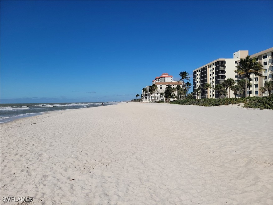 Bayshores at Vanderbilt Beach long beach view. Building is the first onthe right.