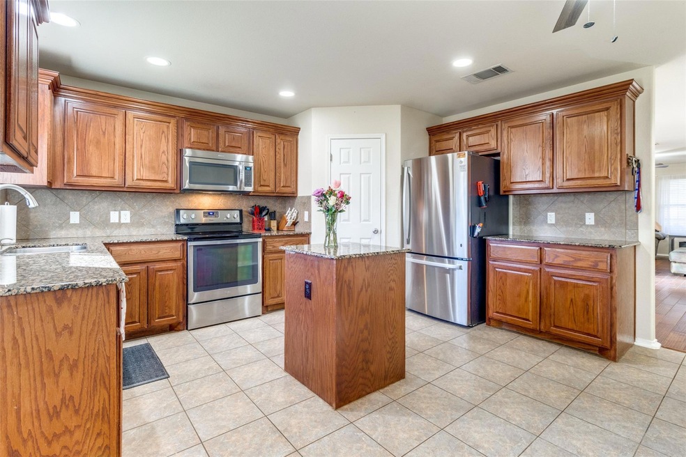 Great priced home!  Gorgeous kitchen! Walk in Pantry, plenty of space for several cooks in the kitchen.