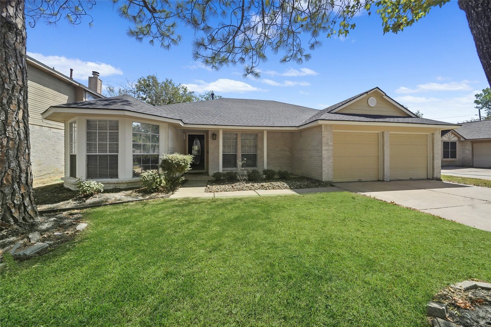 8702 Sunny Ridge Dr, Houston, TX 77095 - photo 1