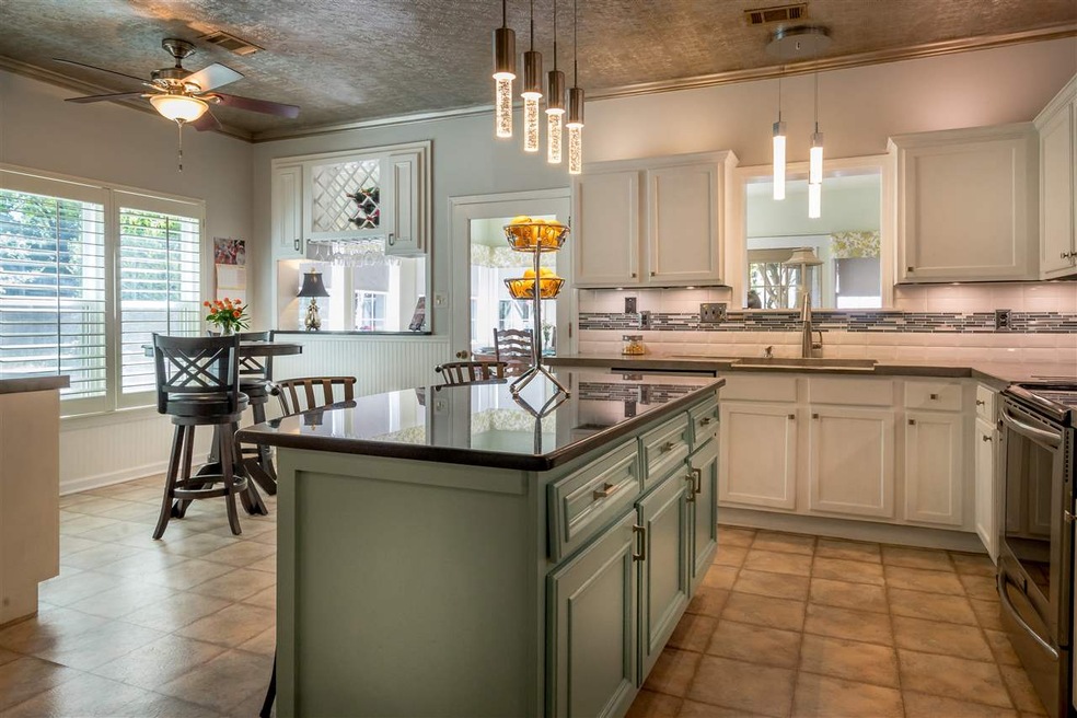 Second view demonstrates kitchen's spaciousness! N