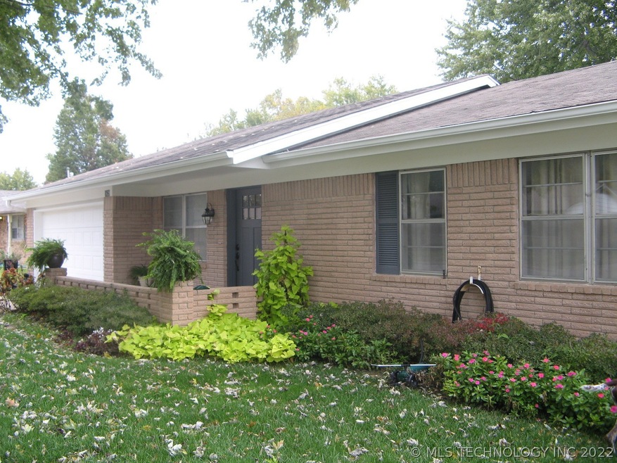 New exterior paint, landscaped, beautiful azaleas bloom in the spring.