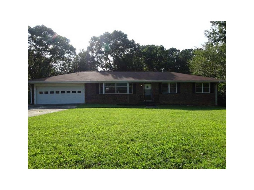 Exterior Front. Front of home with large level yar