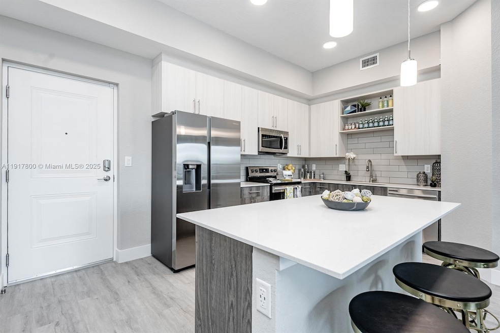 9375 W Commercial Blvd unit 405, Sunrise, FL 33351 - photo 1