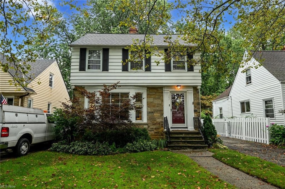 Colonial house with a front lawn