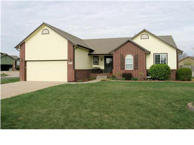 Very nice landscaped yard with irrigation well and