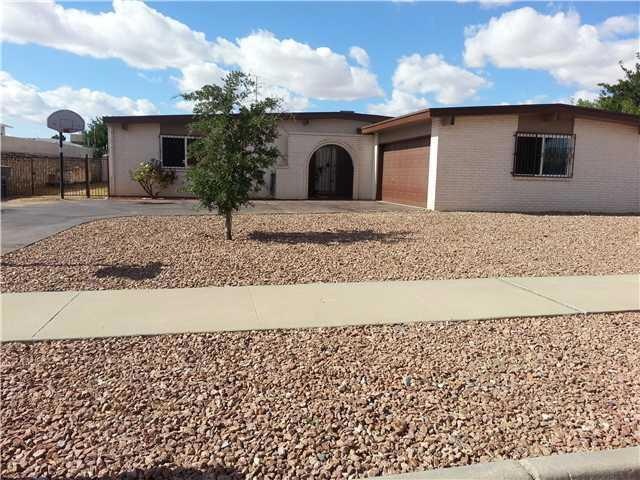 Exterior Front. Front yard landscaped w/