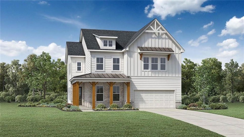 Modern farmhouse with a garage and a front yard