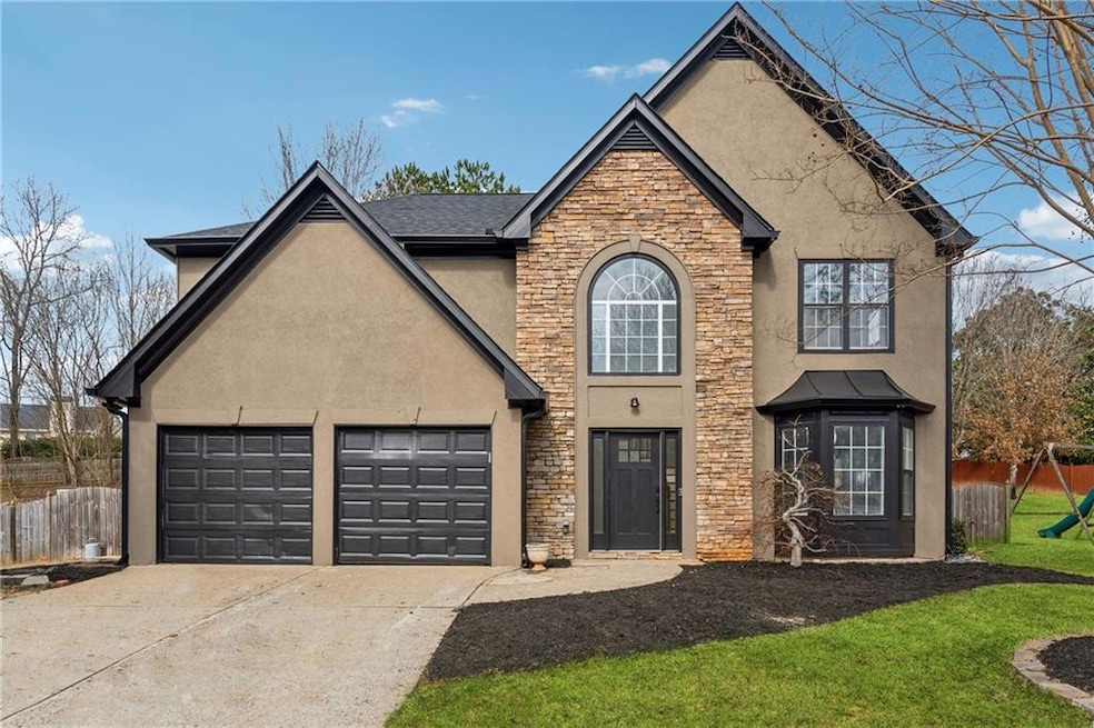 Front of property featuring a garage