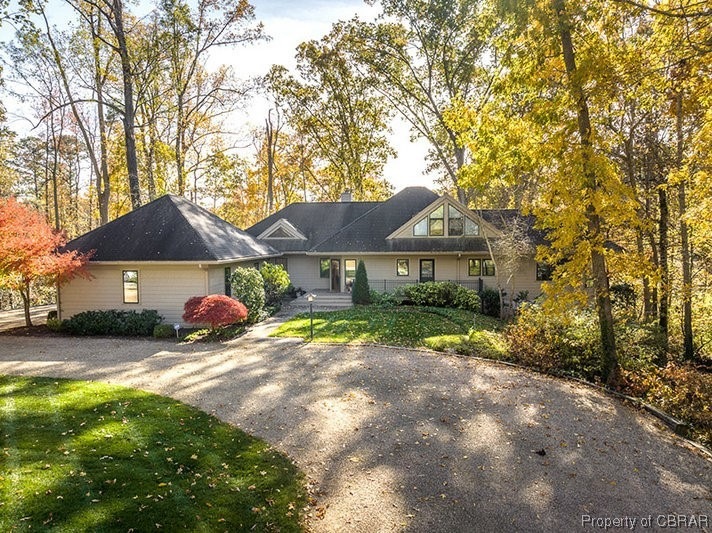 View of front of property with a front yard