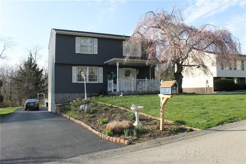 Welcome to this updated 4 bedroom Colonial