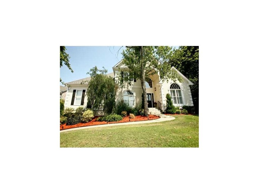 Exterior Front. Distinctive beautifully landscaped front lawn