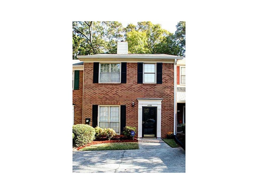 Exterior Front. Cute traditional townhome well car