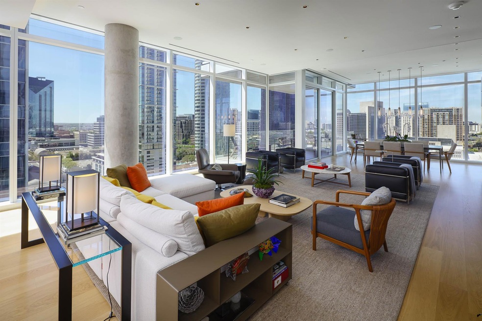 Living room with light wood-style floors, a view o