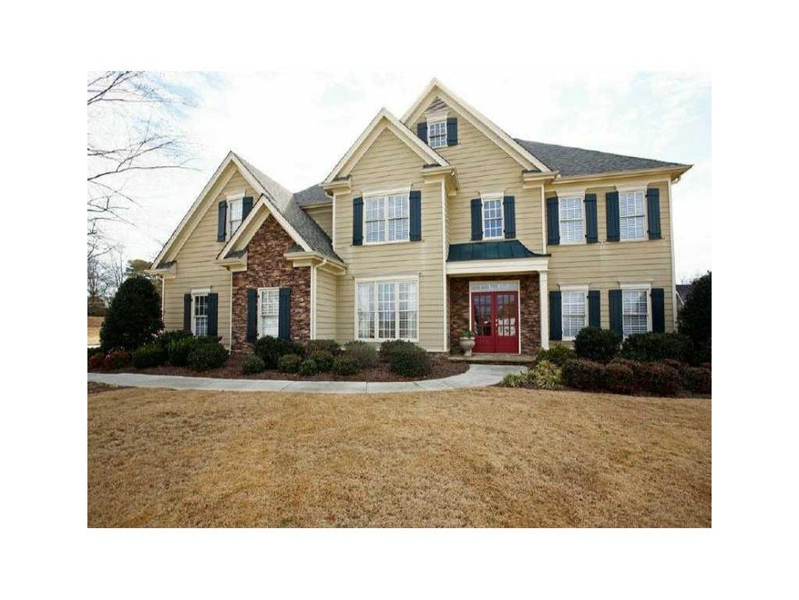 Exterior Front. Classic design with stone accents 