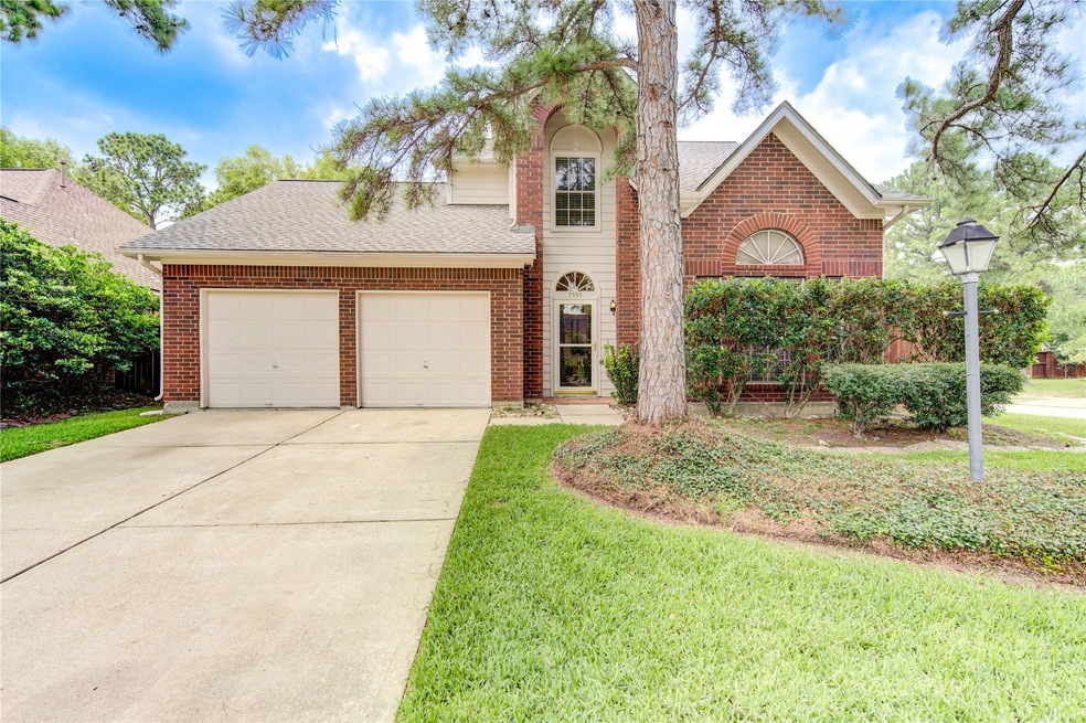 7555 Basswood Forest Ct, Houston, TX 77095 - photo 1