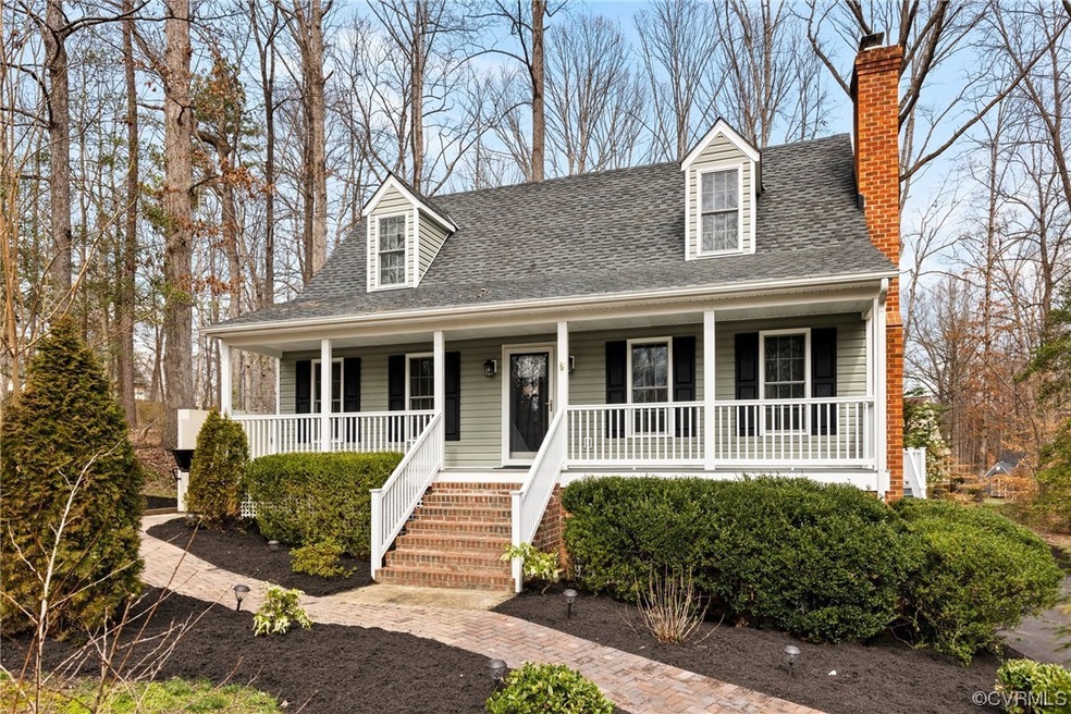 Cape cod home with a porch