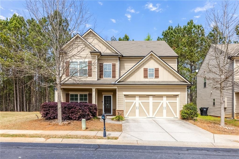 Craftsman house with a garage