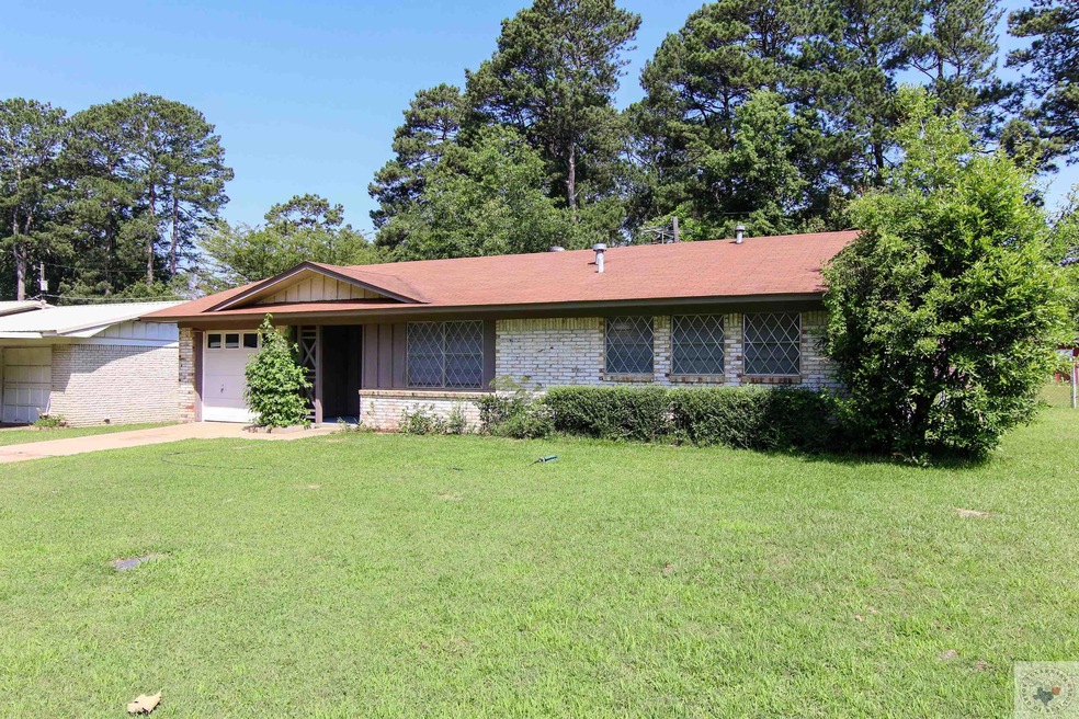 809 Hawkins Ave, Wake Village, TX 75501 - photo 1