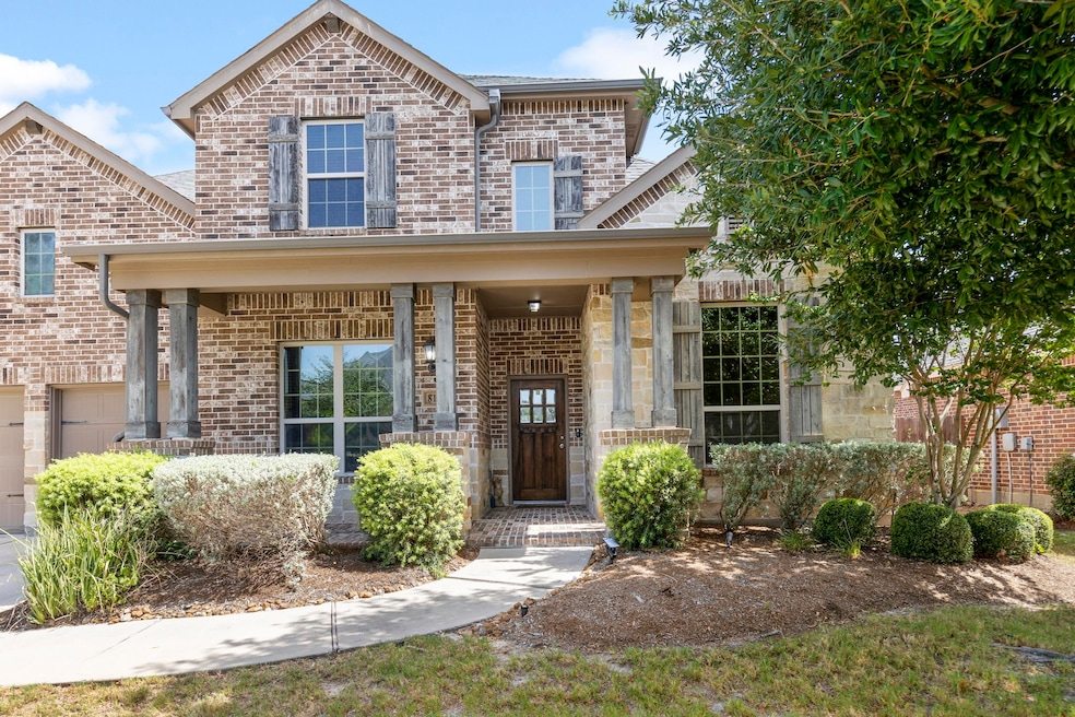 Brick & stone façade welcomes you home.