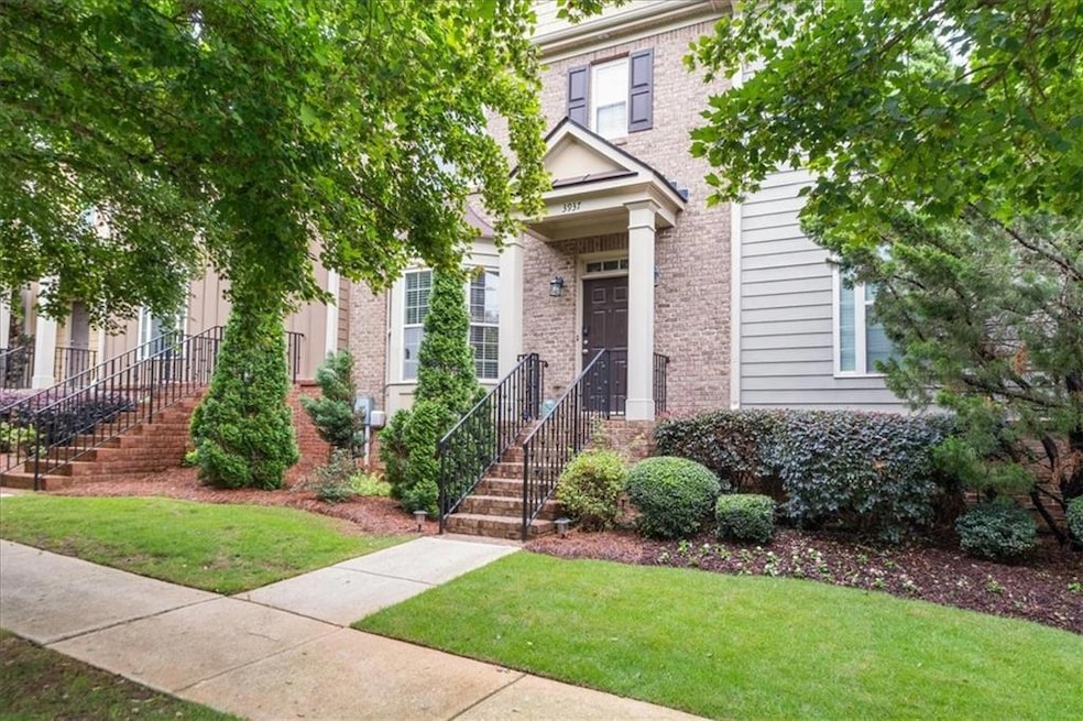 View of front of house with a front lawn and brick siding