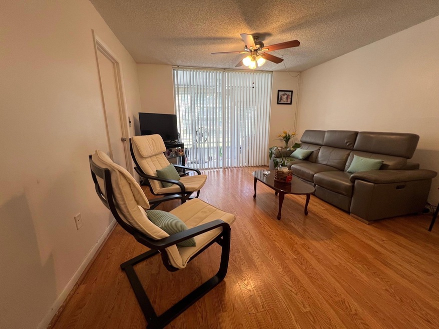 2720 N Pine Island Rd unit 101, Sunrise, FL 33322 - photo 1