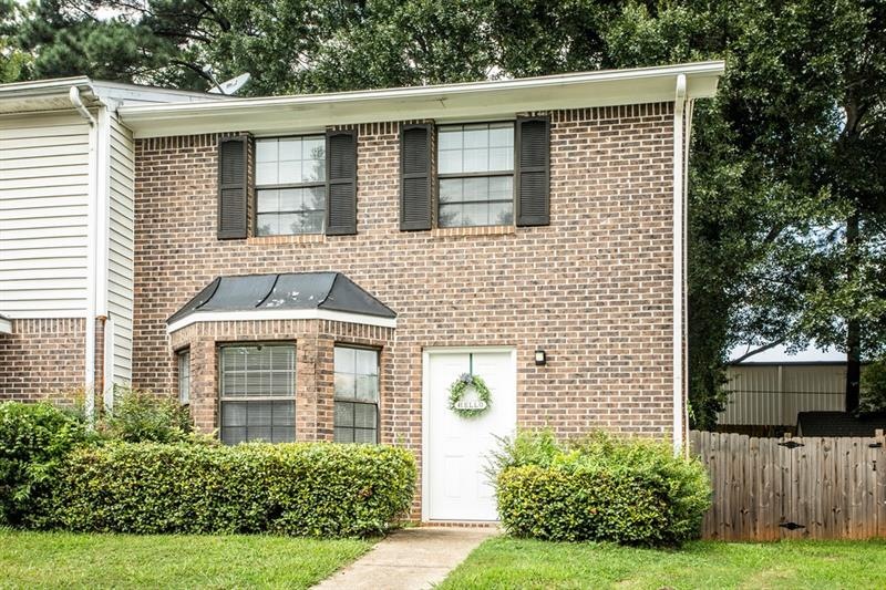 Move in ready end unit townhome with fenced backya