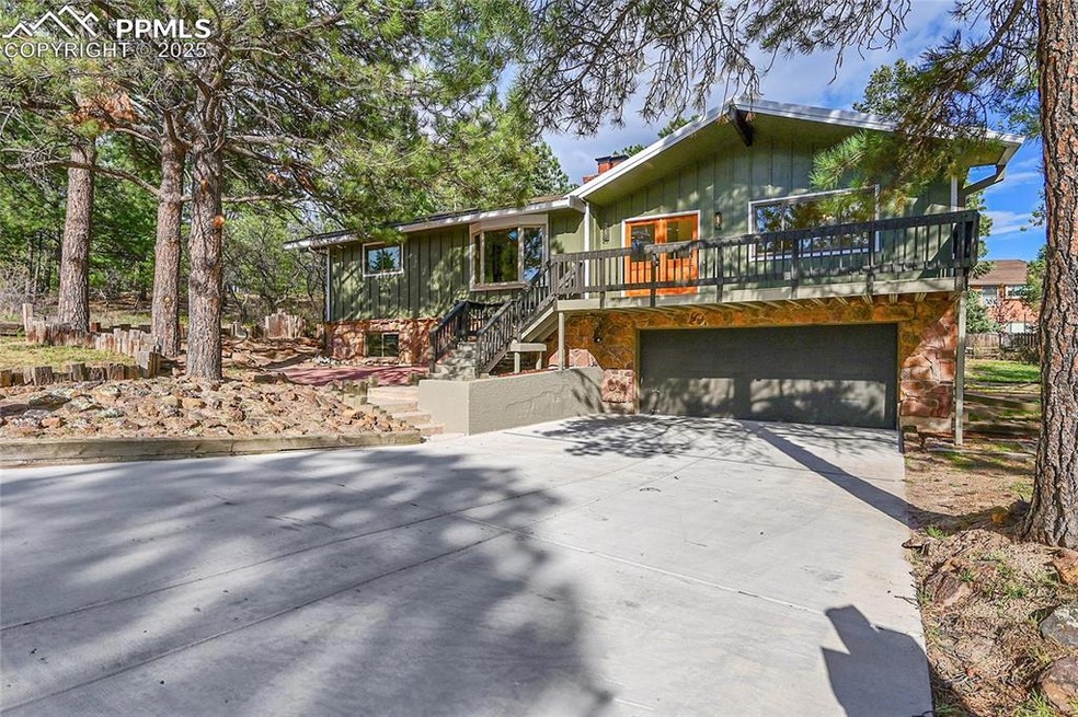 Rustic home with board and batten siding, stairs, 