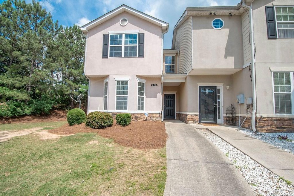 View of front of property with a front yard