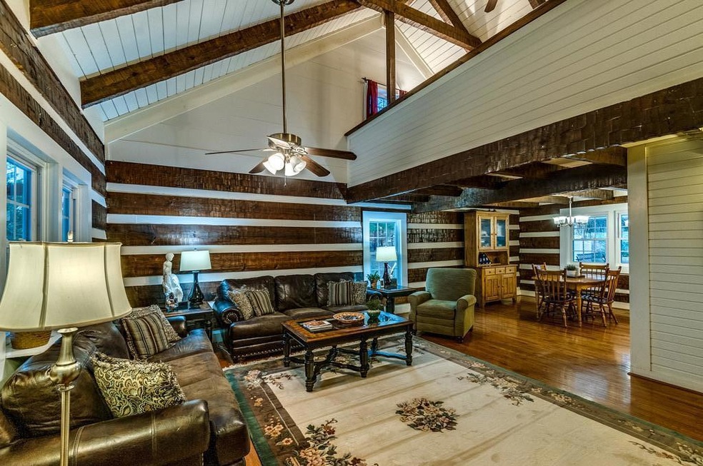 Welcome Home!  Great room, with wood floors and soaring ceiling